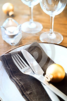 Christmas table place setting in vintage or rustic style.