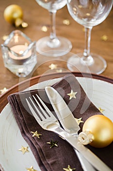 Christmas table place setting in vintage or rustic style