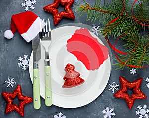 Christmas table setting place with festive decorations and empty