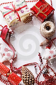Christmas themed items on white wooden background