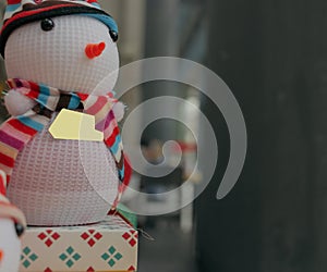 During Christmas, there will be a lovely snowman doll gift