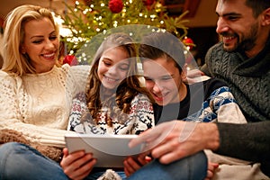 Christmas time- fun family with digital tablet
