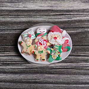 Christmas time: handmade gingerbread for decoration with santa c