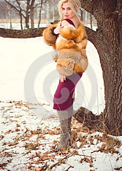 Christmas time, woman posing at fashionable look