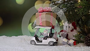 Christmas toy on fake snow. Winter season and holiday decoration background