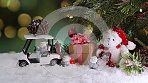 Christmas toy on fake snow. Winter season and holiday decoration background