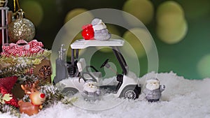 Christmas toy on fake snow. Winter season and holiday decoration background