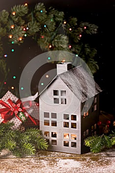 Christmas Toy House Snowing Wooden Background Concept of Winter Holiday Card or Concept New Year Warm and Cozy Christmas House