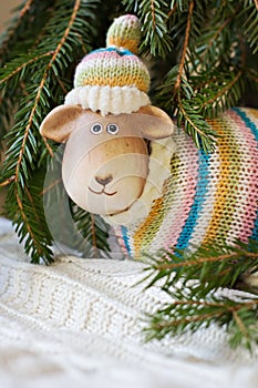 Christmas toy lamb and branches