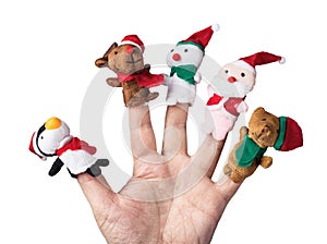 Christmas toys put on a hand on a white