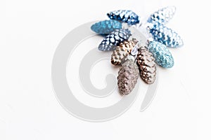 Vibrante colors cone toys on white textured background photo