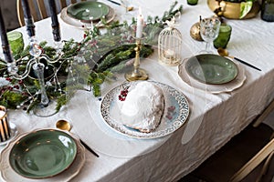 Christmas traditional fruit bread stollen. Traditional German Christmas cake Stollen, sweet fruit loaf with icing sugar