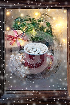 Christmas  treats   at winter window,  selective focus