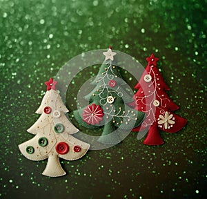 Christmas tree applique with space for text. Christmas tree made of fabric, buttons isolated on green background with