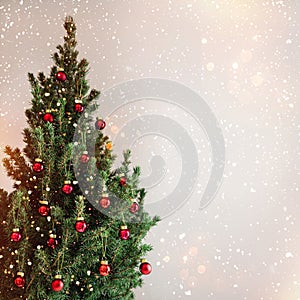 Christmas tree background and Christmas decorations with snow, blurred, sparking, glowing.