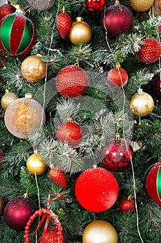 Christmas tree background. Cloce-up Beautiful Christmas tree with decor as background.