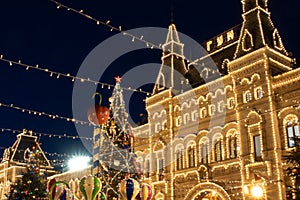 Christmas tree on the background of GUM, Red Square, Moscow, Russia