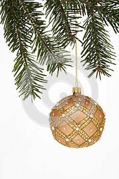 Christmas Tree Ball on spruce - Weihnachtskugel mit Tannenzweig photo