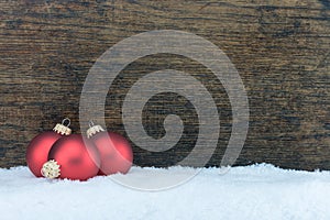 Christmas tree ball and wooden background