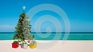 Christmas Tree on the beach. Merry Christmas. Present gift box. Happy New Year. Winter Holidays. Miami Florida vacation