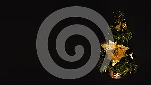 Christmas tree on a black background top view. Horizontal Christmas banner for the site