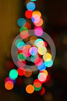 Christmas tree with bokeh lights, abstract christmas background photo