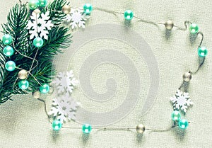 Christmas tree branch, beads garland, snowflakes