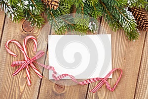 Christmas tree branch and blank greeting card