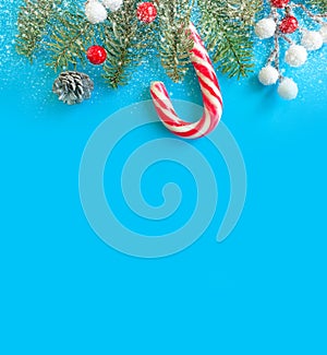 Christmas tree branch, decorate vintage   border  candies a colored background