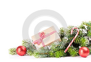 Christmas tree branch with gift box