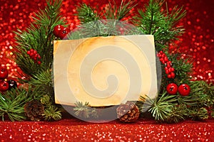 Christmas tree branches with blank note