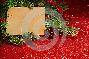 Christmas tree branches with blank note