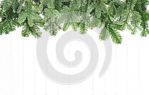 Christmas tree branches bright wooden background Undecorated evergreen twigs