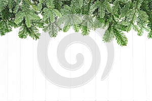 Christmas tree branches bright wooden background Undecorated evergreen twigs