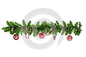 Christmas tree branches with red baubles, golden stars, snowflakes isolated on white - horizontal border