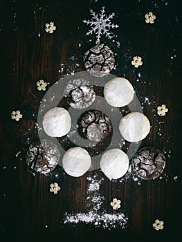 Christmas tree built of cookies chocolate with cracks and white shortbread. Advent cakes. New Year, Xmas card. Selective focus.