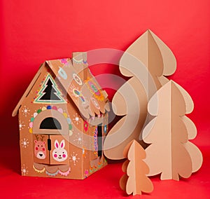 Christmas Tree and Cardboard playhouse Made Of Cardboard. Unique Trees. New Year or Xmas