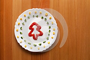 Christmas tree of catsup on a plate