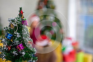 Christmas tree and Caucasian woman celebrating holiday festival traditonal with Christmas tree and gift box with friend