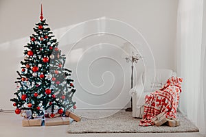 Christmas tree with Christmas gifts in White Hall on Christmas