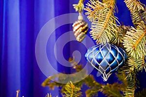 Christmas tree and Christmas glass toy blue background