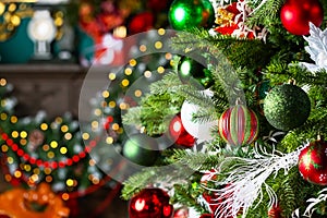 Christmas tree and Christmas home holiday decorations with balls and bokeh light