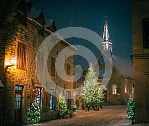 Christmas tree and Church, snowy night, Petit-Champlain, Old Quebec City, Canada