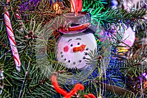 Christmas Tree Close up with Snowman Ornament