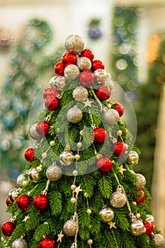 Christmas tree decorated with balls of red, gold and silver colors