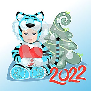 Christmas tree decorated with balls and ribbons. Year of Blue Tiger. Gift in hands of baby. Children`s photo frame. Cute baby