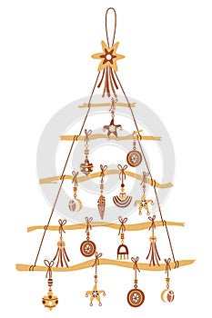 Christmas tree decorated with boho baubles and star on top.