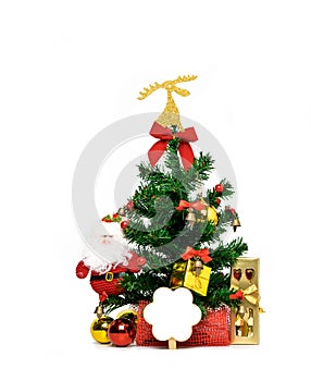 Christmas tree decorated with ribbon, card, fork and spoon in golden gift box, Santa Claus and ball on white background with copy