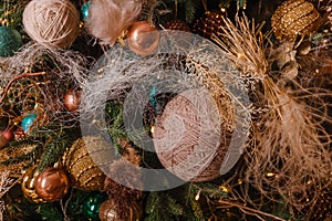 Christmas tree decorated with yarn and ears close. provocative decor for Christmas. original decor 2022