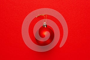 Christmas tree decoration ball on red background